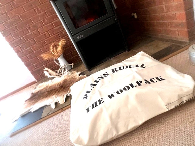The Woolpack Dog Bed beside a fireplace — elegant rural homestead styling by Plains Rural